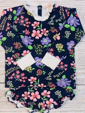 The Beaufort Bonnet Co. Floral Navy Ruffle Baby Top - Pink & Purple Flowers